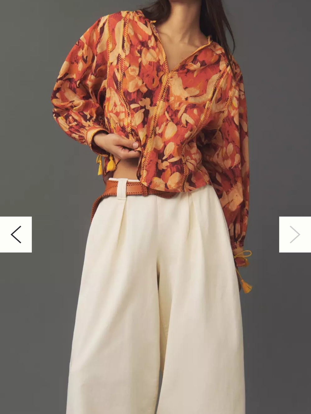 Anthropologie Orange Floral Blouse with stitch detail. NWOT